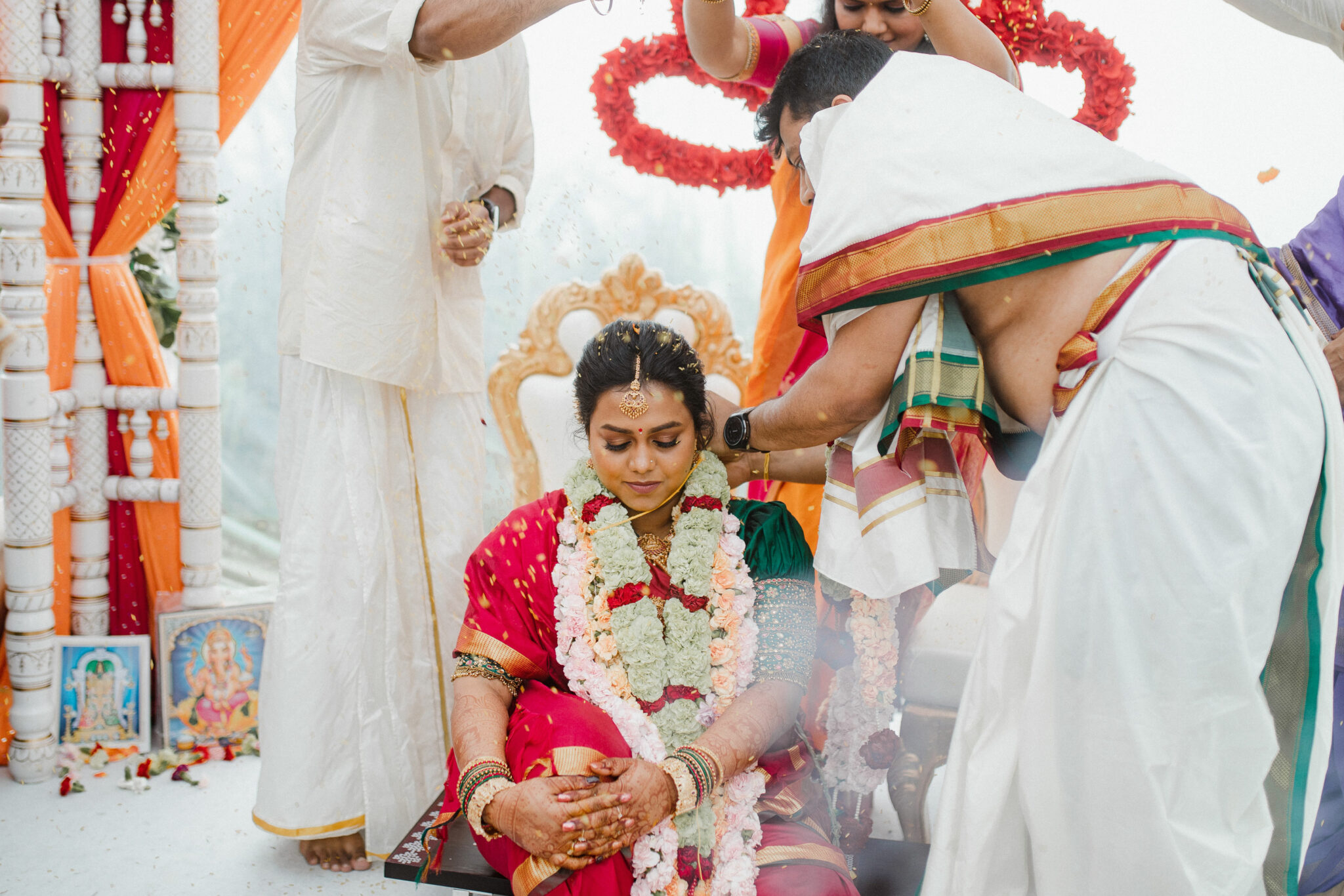 bride putting on the thali