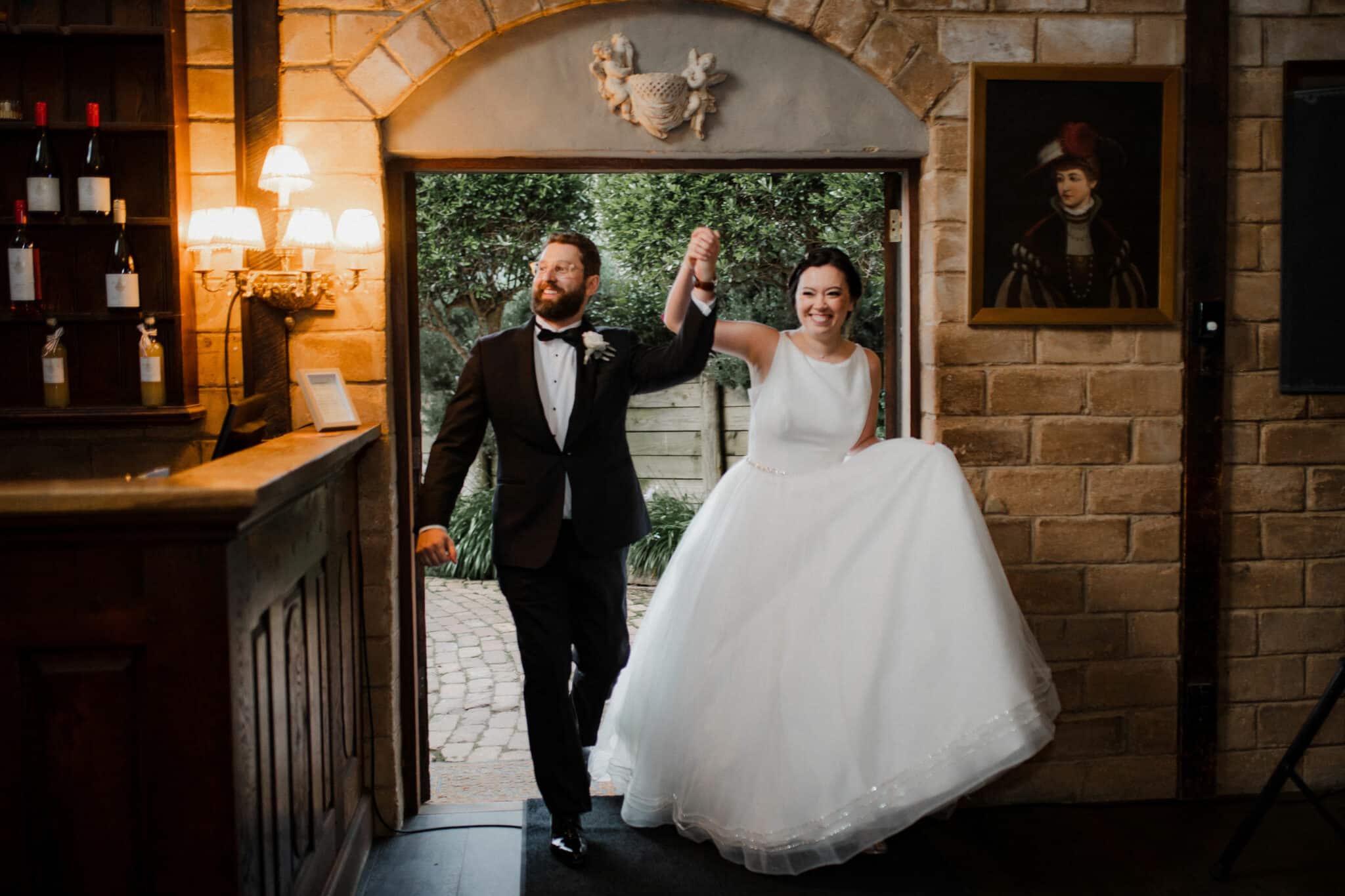 couple entering the reception at mudbrick
