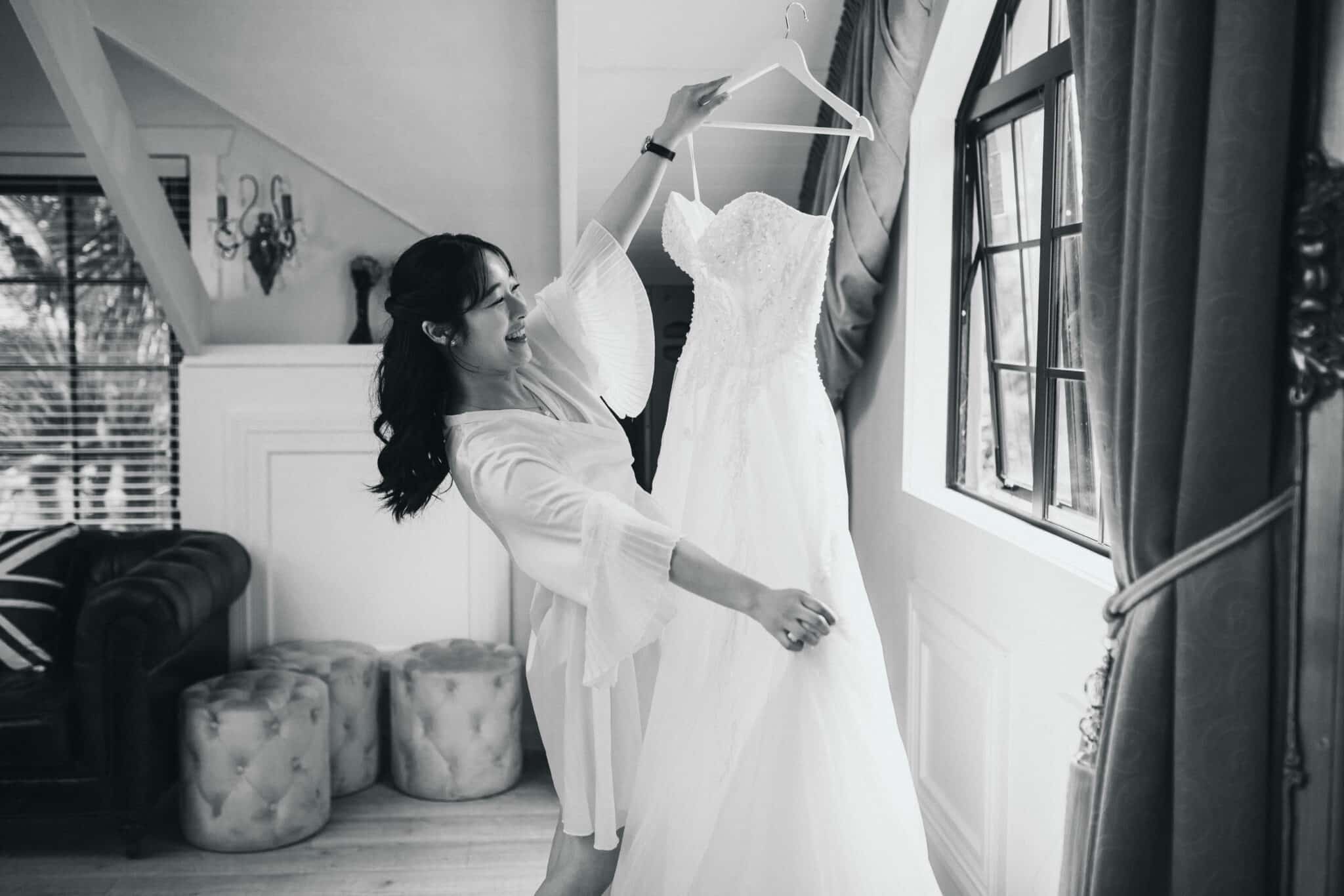 bride looking at her dress