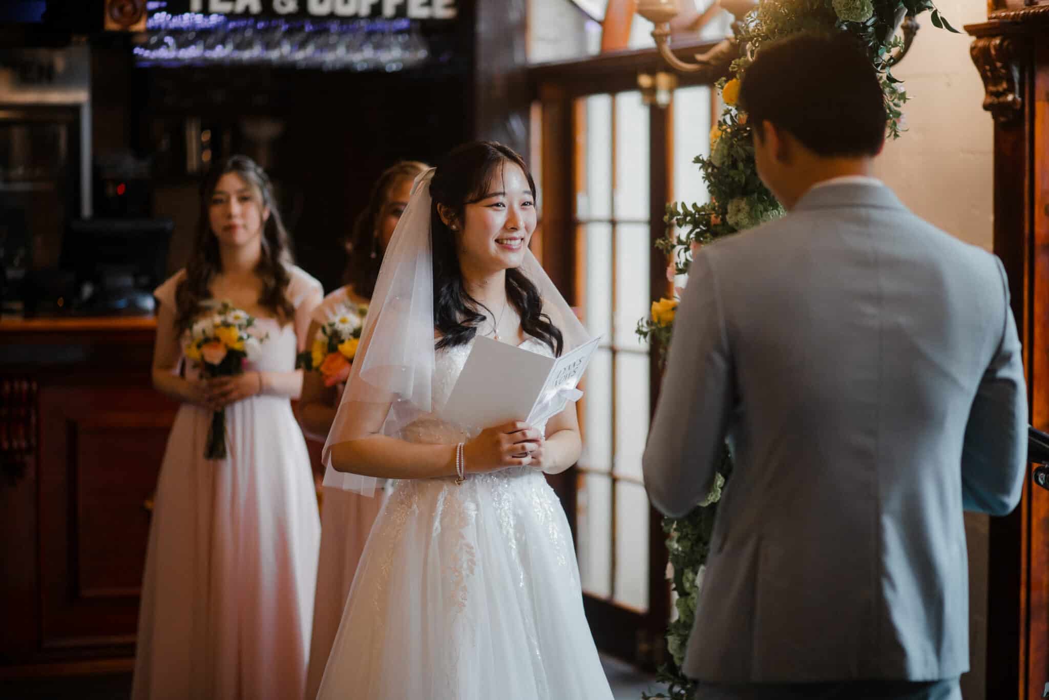 bride smiling at the groom