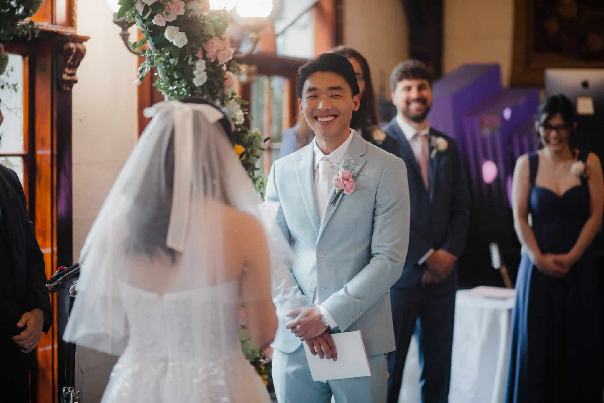 groom reading wedding vows