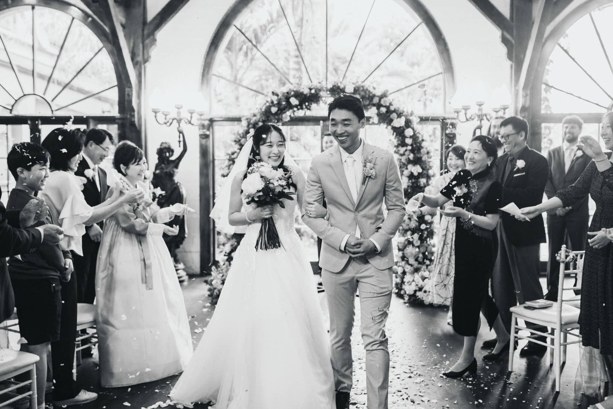 bride and groom recessional black and white