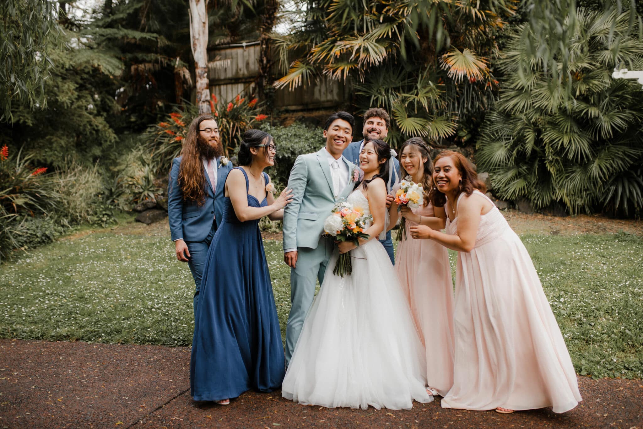 wedding party and the bride and groom