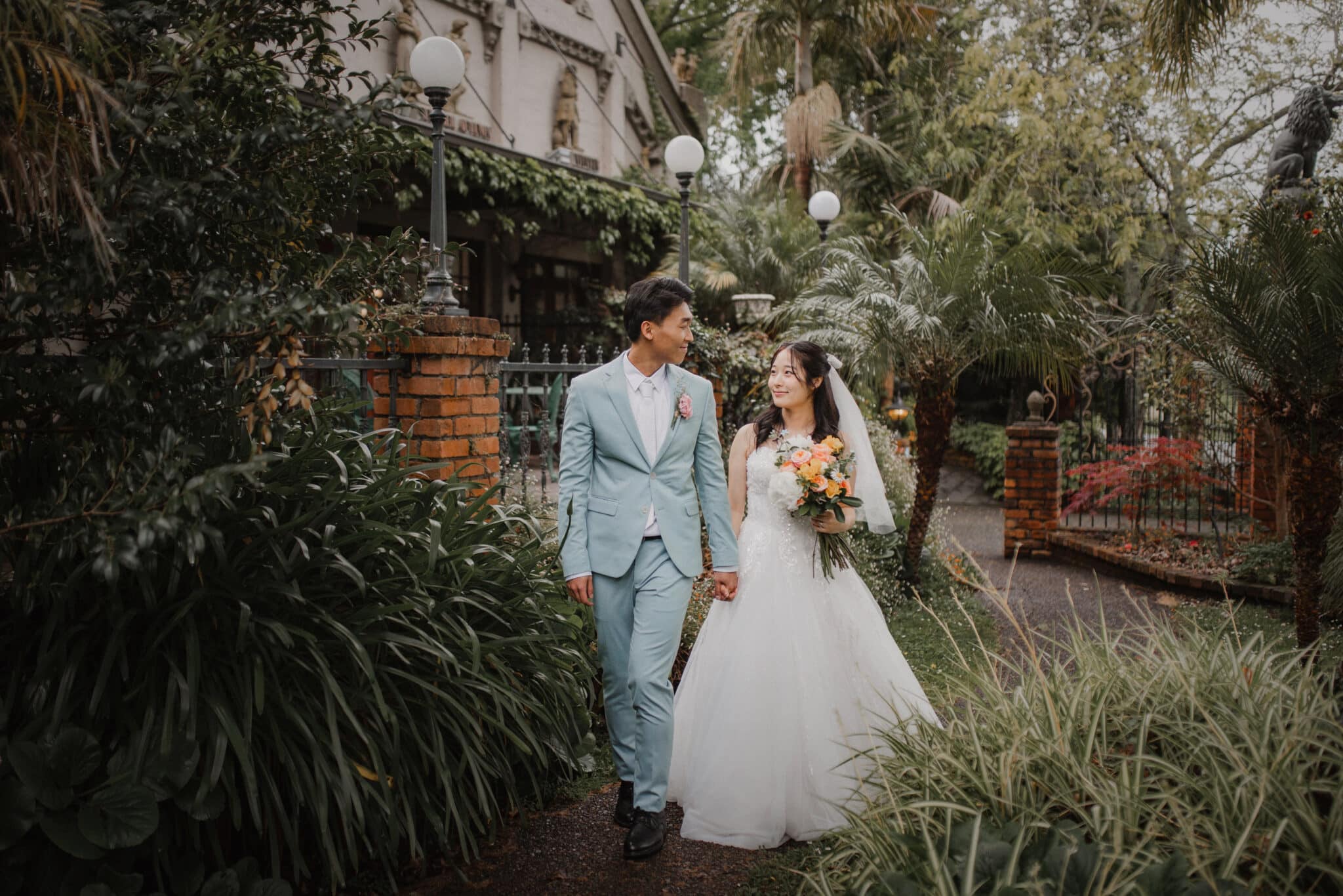 bride and groom walking and chatting