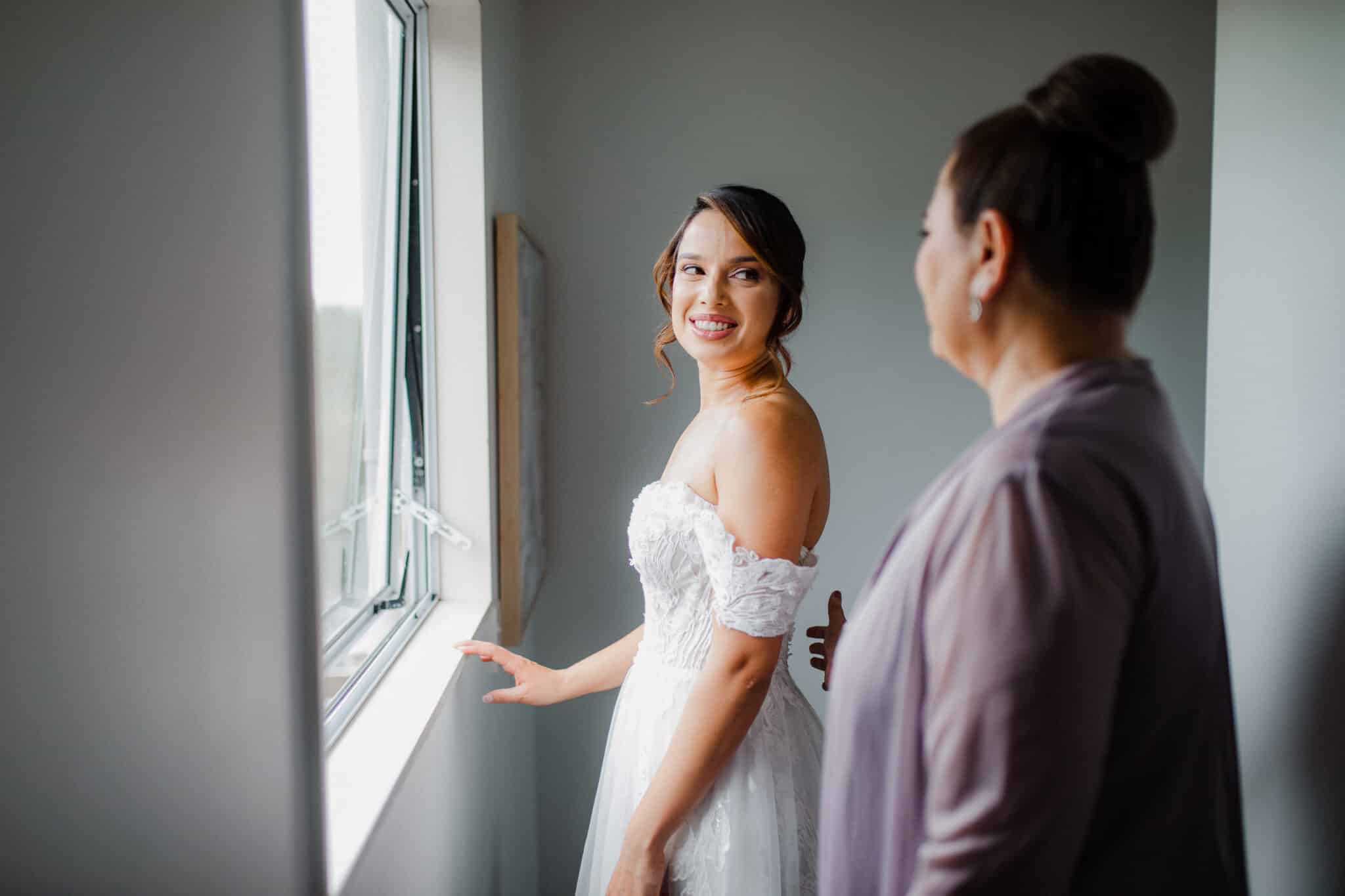 bride looking at mother