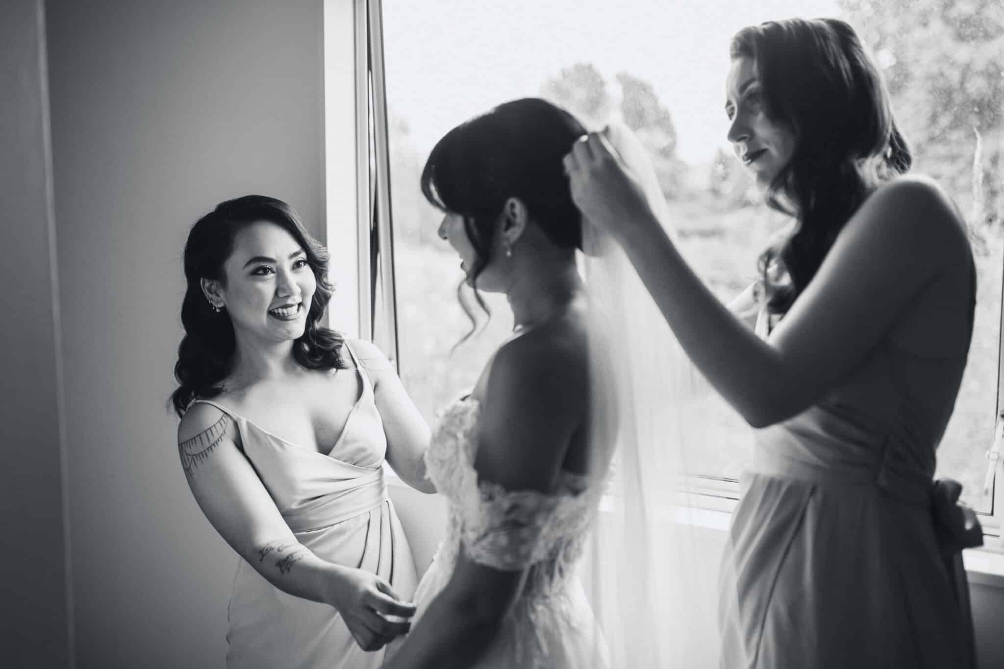 bride and bridesmaids getting ready
