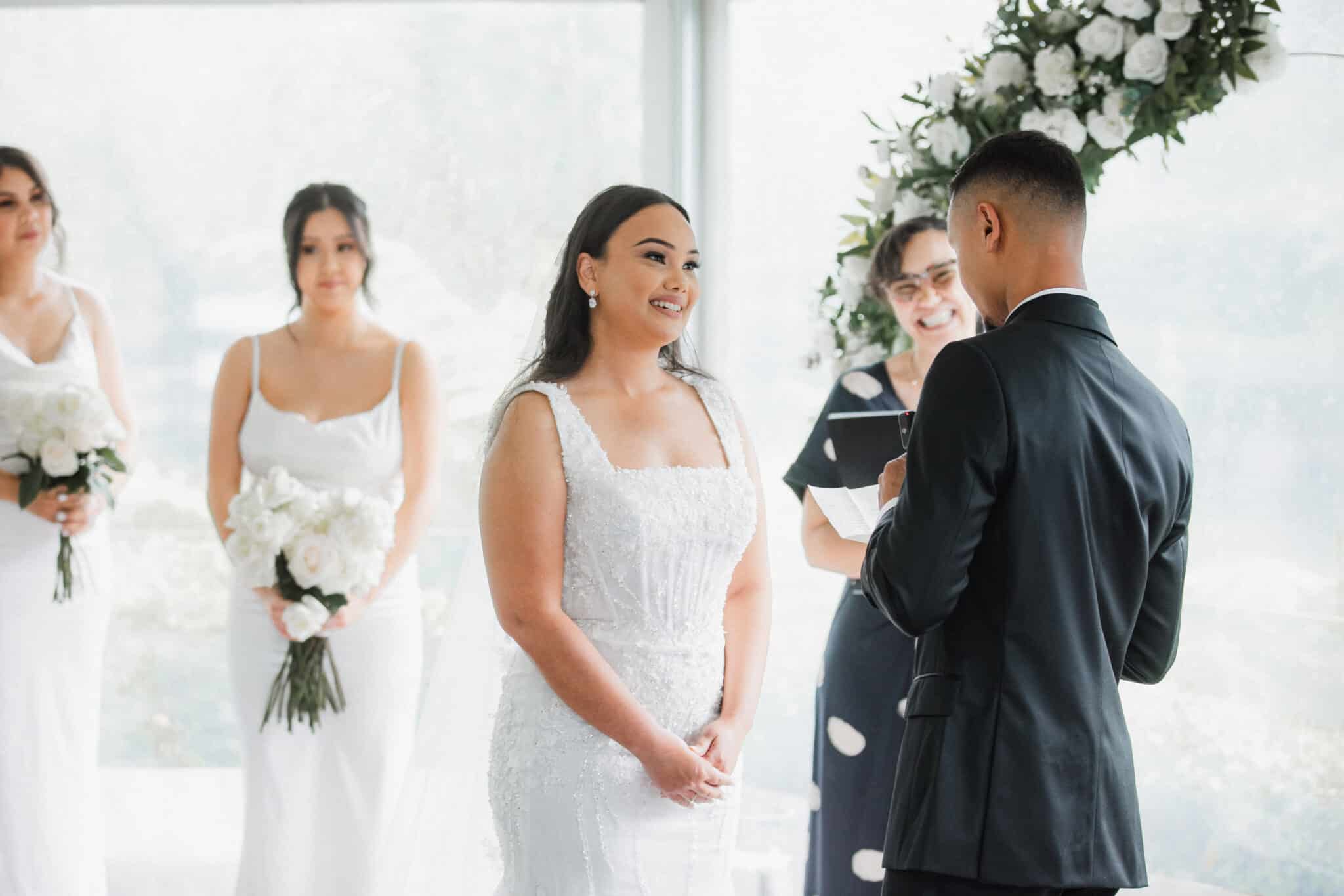 bride looking at the groom